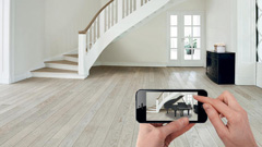 Steinway Augmented Reality App by ViewAR, projection of piano on iPhone is an example of AR.