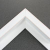 This large, L-shaped canvas floater frame features White w/Red Lines, and a 1-1/8 " flat face.
*Note: These solid wood, custom canvas floaters are for stretched canvas prints and paintings, and raised wood panels.
