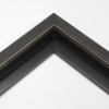 This simple, canvas floater frame features rustic wood lightly coated in charcoal grey/black paint. The top coat is rubbed away in places to reveal the natural wood color below, for a soft, antiqued look.
3/4 " wide: ideal for small and medium-size images. Whether photography or paintings, rural scenes and simple images will look striking in this frame.