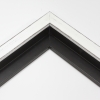 This simple, flat faced canvas floater frame features rustic wood lightly coated in white paint. The top coat is rubbed away in places to reveal the natural wood color below, for a soft, antiqued look.
3/4 " wide: ideal for small and medium-size images. Whether photography or paintings, rural scenes and simple images will look striking in this frame.